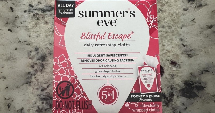 pink and white box of Summer's Eve Daily Cleansing Wipes 12-count on a grey granite countertop