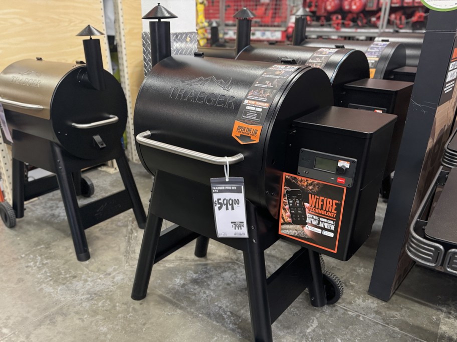 black traeger grills on display in store