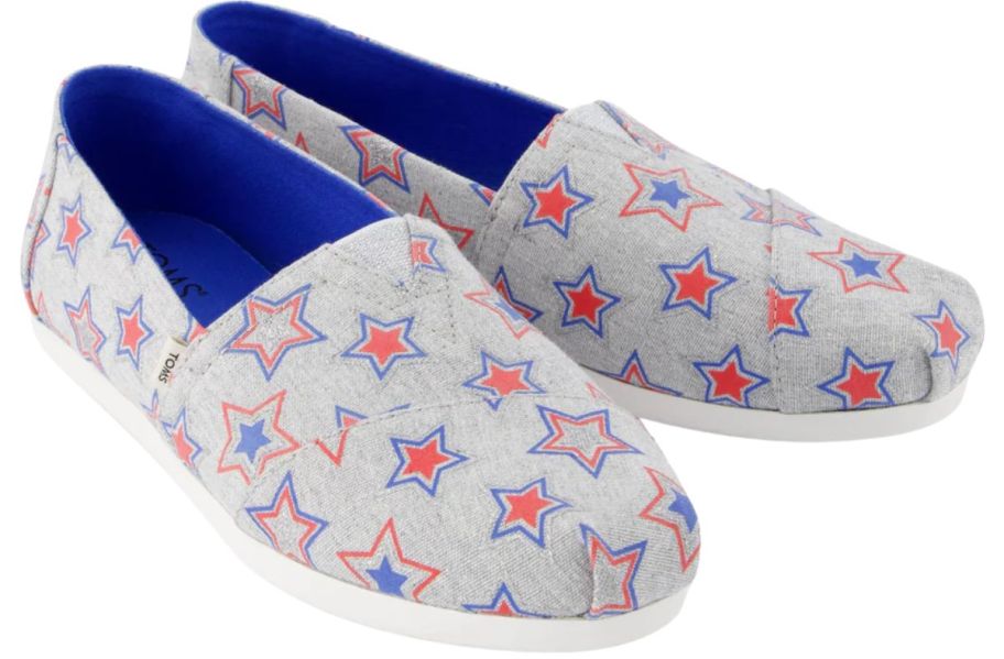 glow in the dark star patterned TOMS alpargatas stock image 