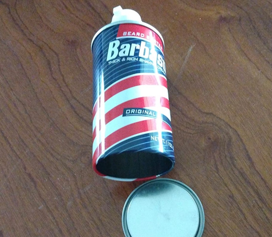 empty can of barbasol shaving cream with false bottom