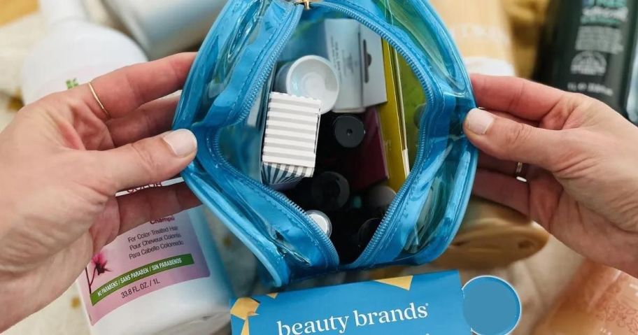 fingers opening a beauty brands discovery bag