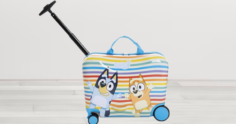 bluey ride on kids luggage in room 