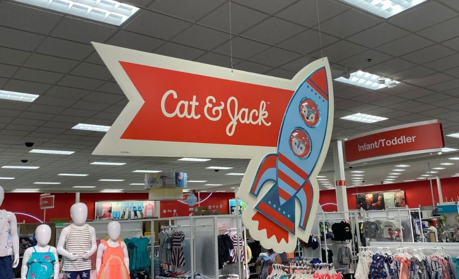 a cat and jack hanging sign in a cat and jack kids department in a target store