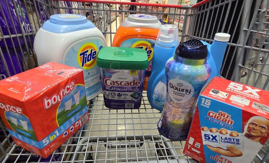 a costco cart with laudry detergent, fabric softner, Dishwasher Pods, and scent booster beads. 