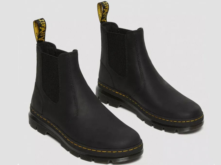 pair of black dr marten boots 