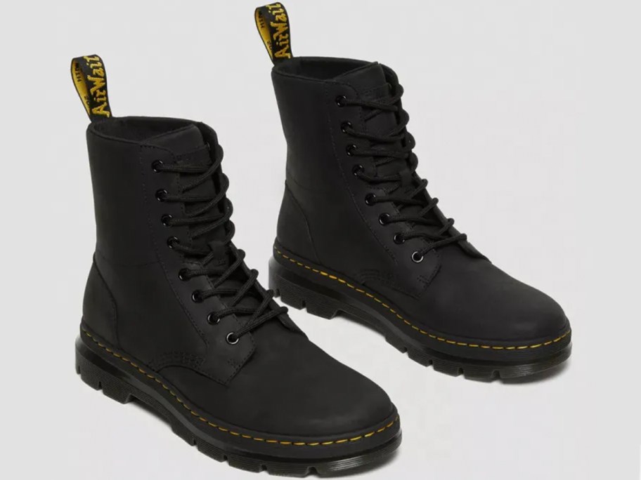 pair of black dr marten boots 