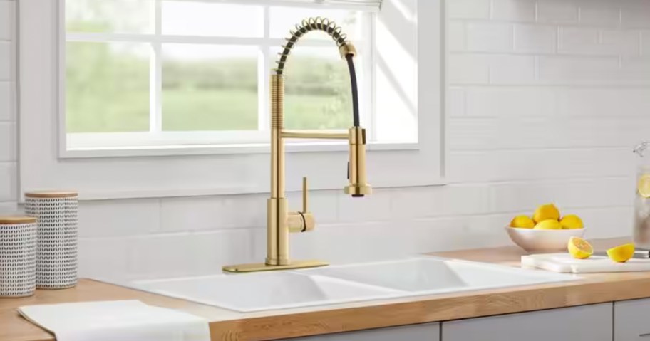 gold kitchen faucet in kitchen