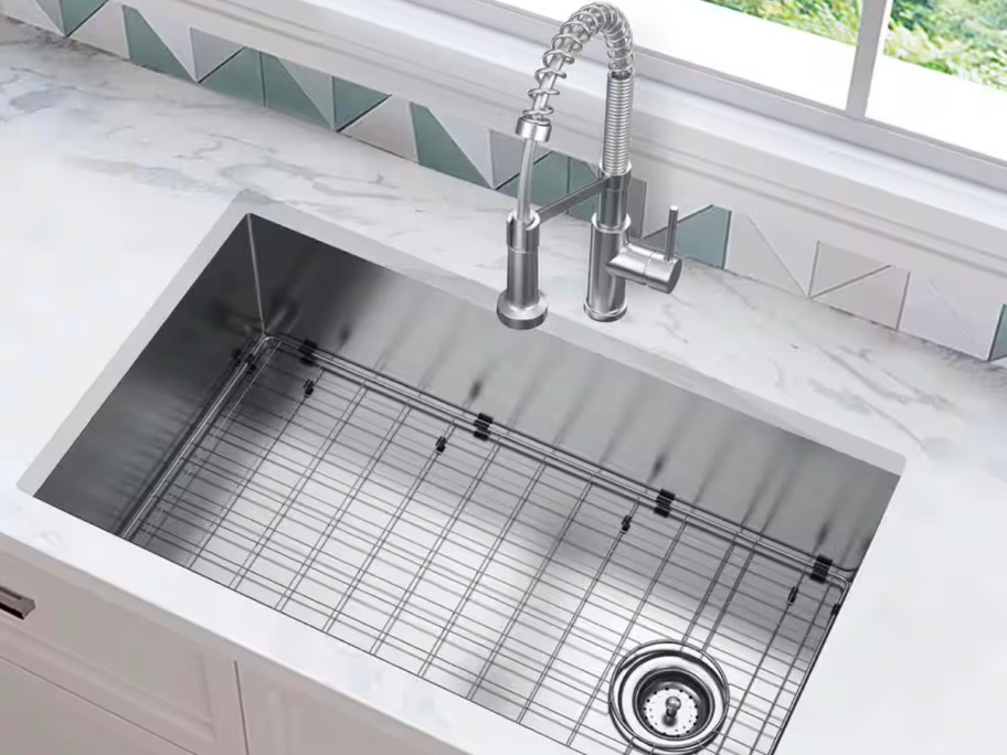 stainless steel kitchen faucet and sink in kitchen