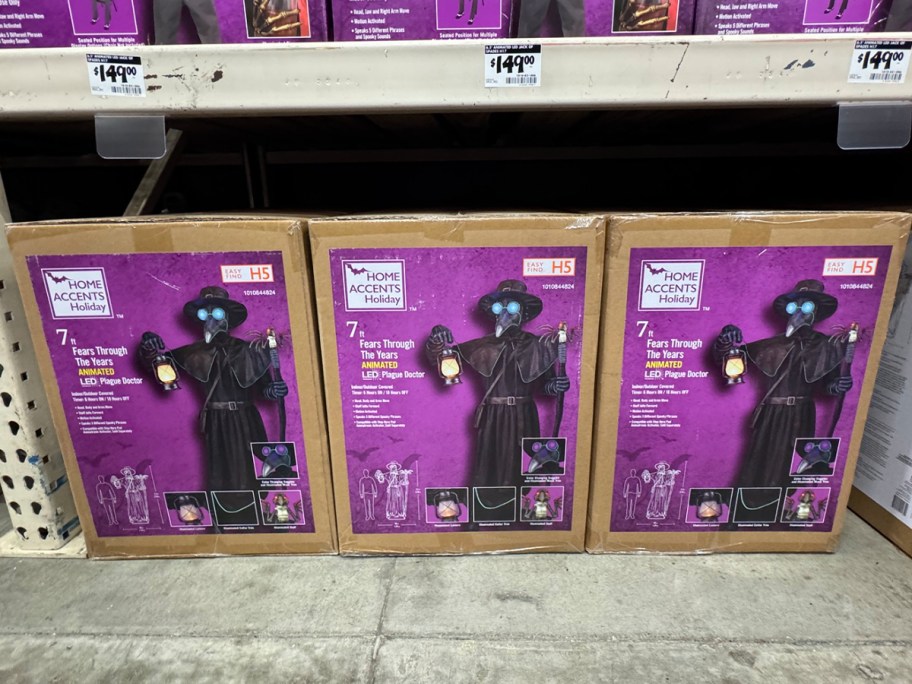 three plague doctor animatronic boxes at home depot