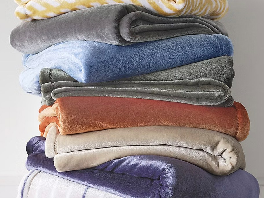 stack of folded blankets 