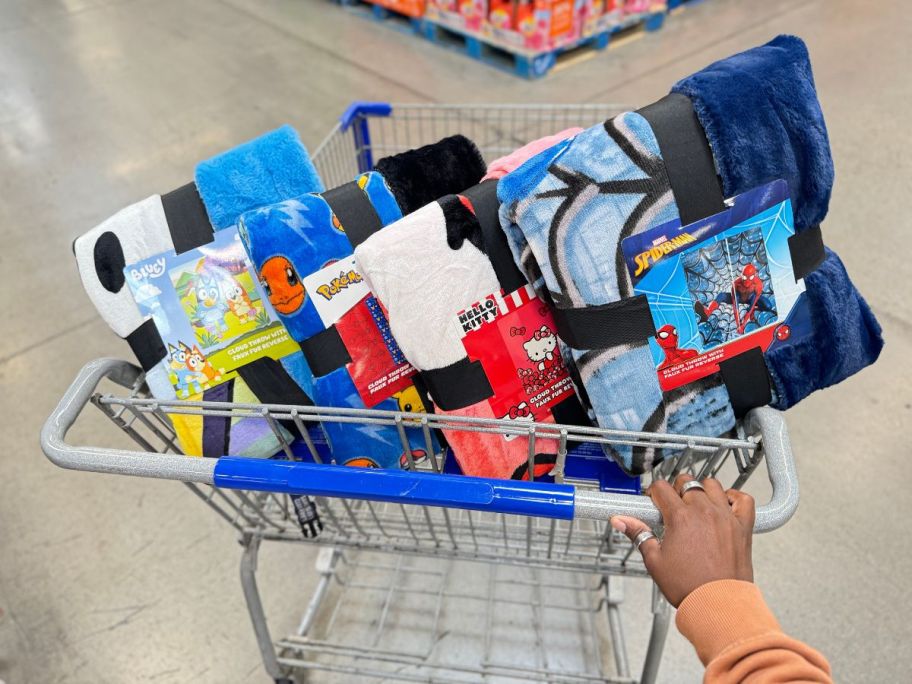 4 kids cloud blankets in a sams club shopping cart