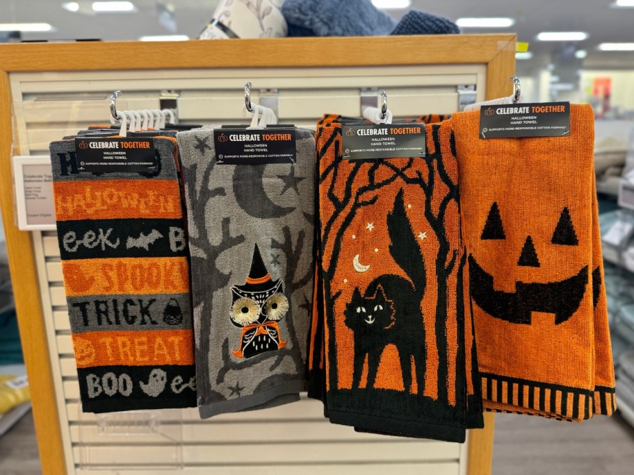 4 different styles of Halloween Hand Towels hanging on display at Kohls