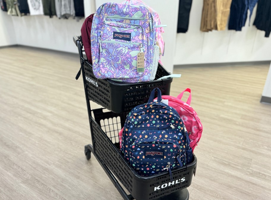 kohls jansport backpacks displayed on a cart