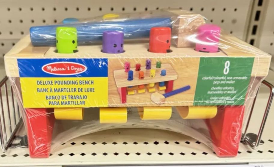 Melissa & Doug Deluxe Pounding Bench on shelf 