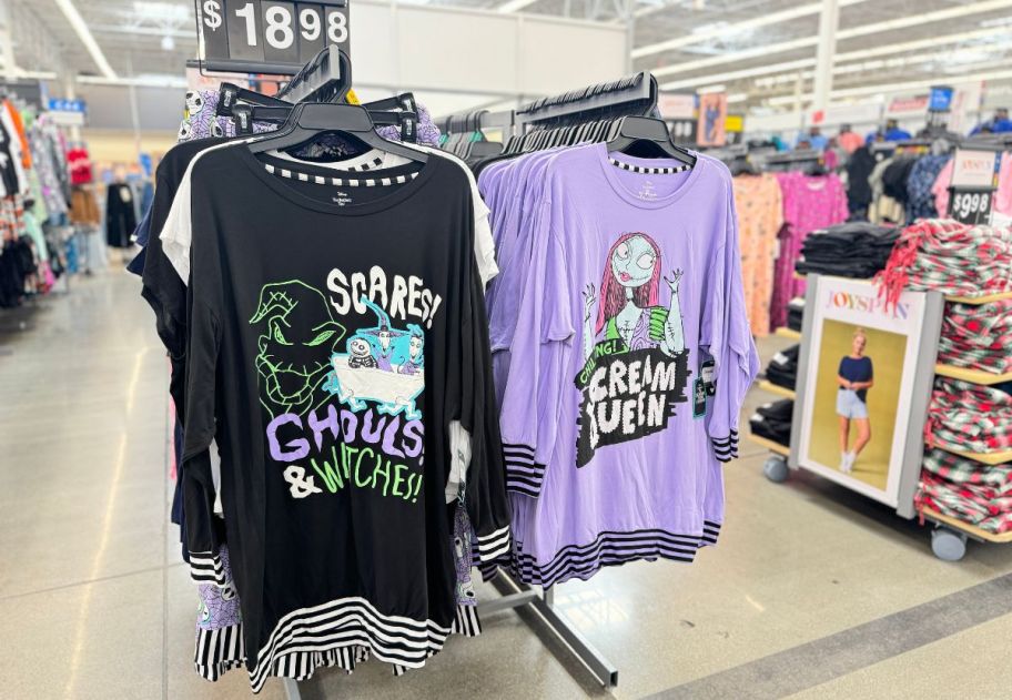 two nightmare before chirstmas sleep tees on a rack in a walmart store.