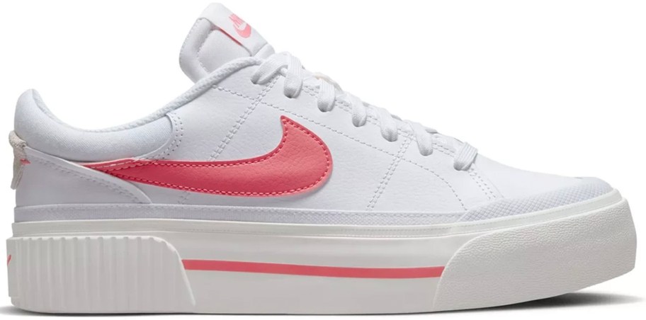 white and pink nike shoe