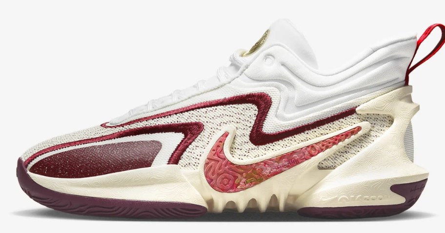 white, off white, burgundy and reddish color Nike basketball shoe