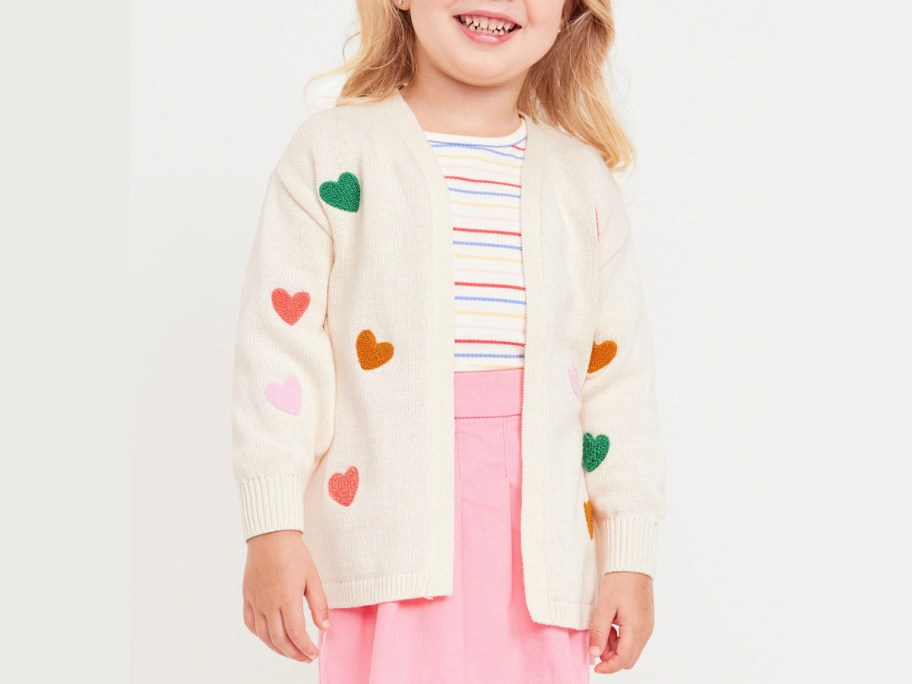 toddler girl in white heart cardigan