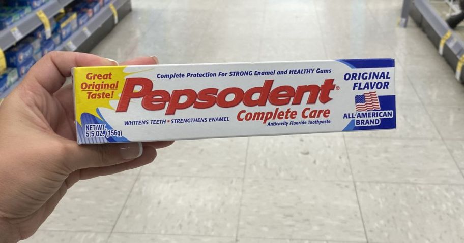 Pepsodent onlineplete Care Anticavity Fluoride Toothpaste in hand in store