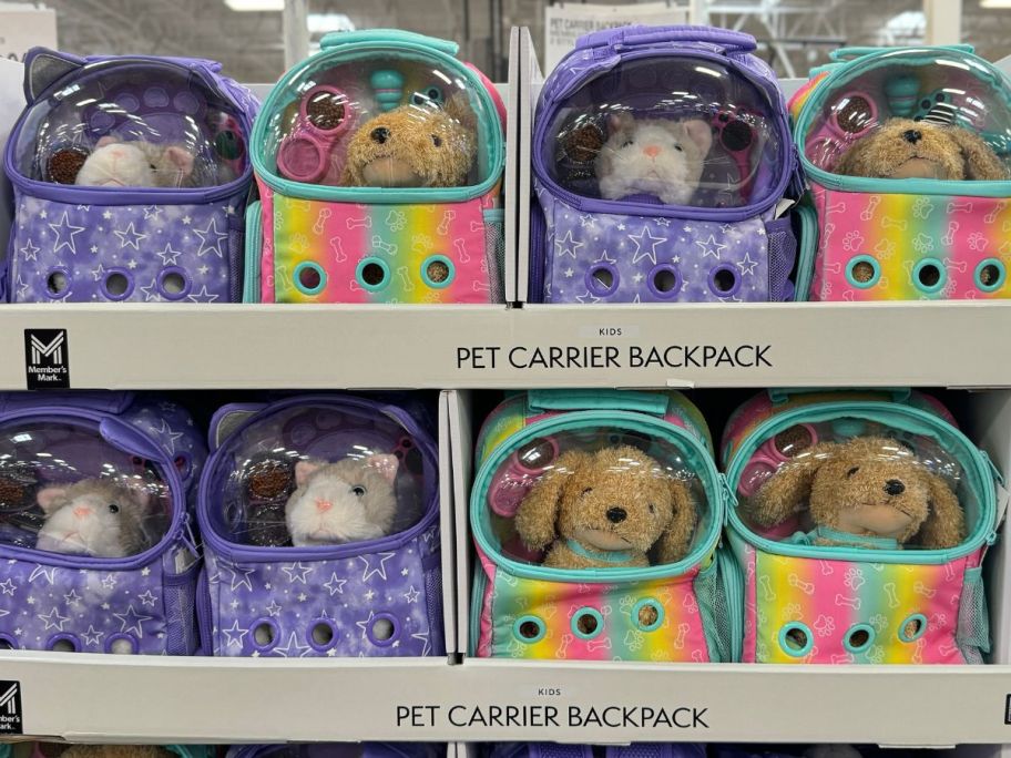 kids pet carrier backpacks on display in a sams club