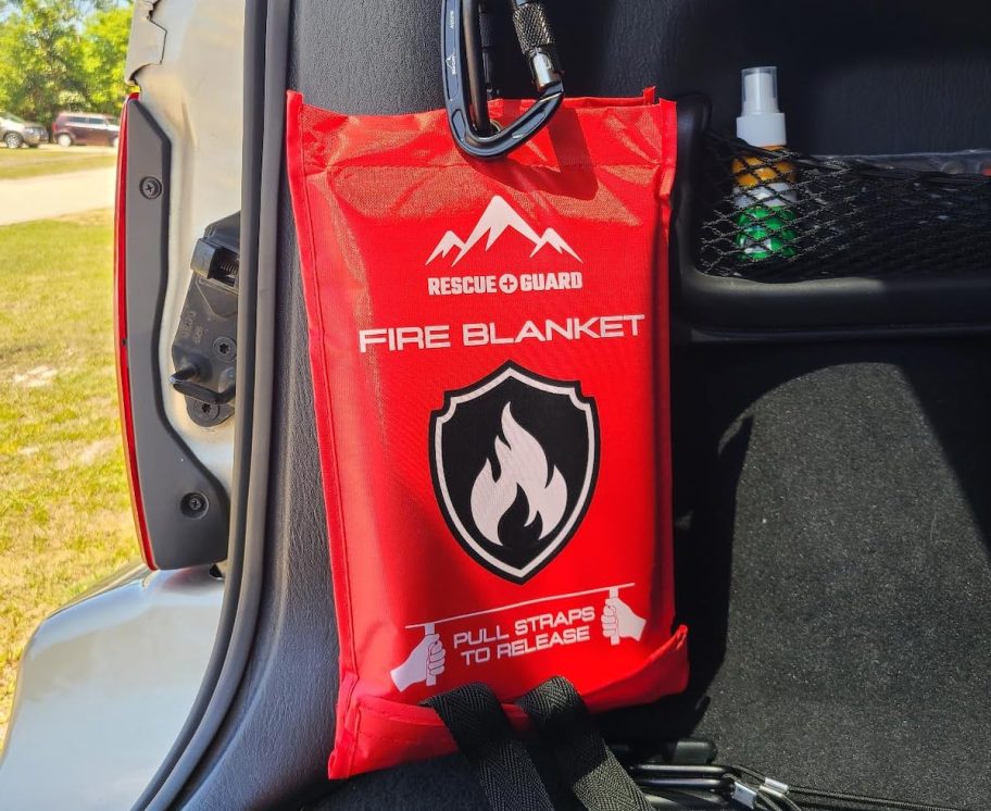 emergency fire blanket hanging in car