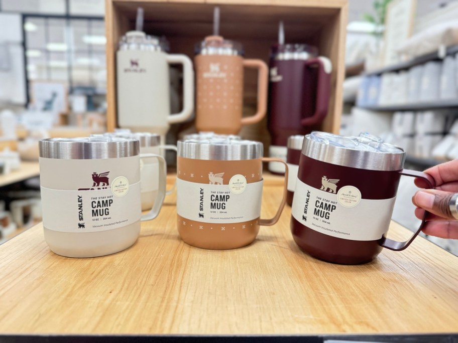 stanley mugs and tumblers on display in a store