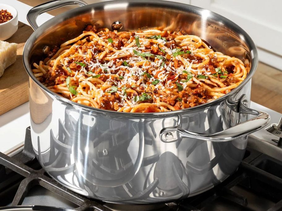 T-Fal Pro Tri-Play Stainless Steel 6-Quart Dutch Oven on stove with pasta in it