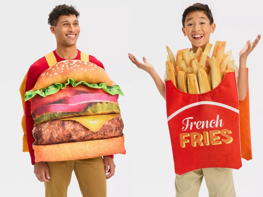 man wearing burger costume and child wearing fries costume