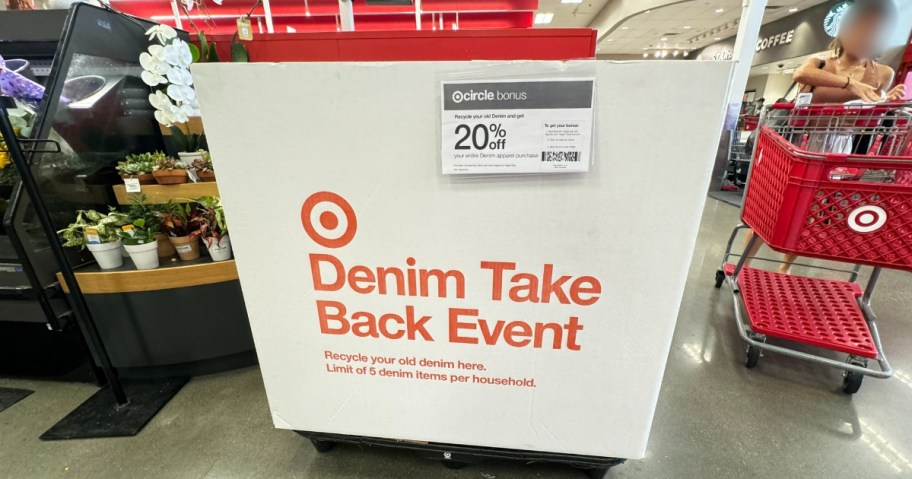 large white box at Target with Target logo that says "Denim Take Back Event" and a sign with 20% off