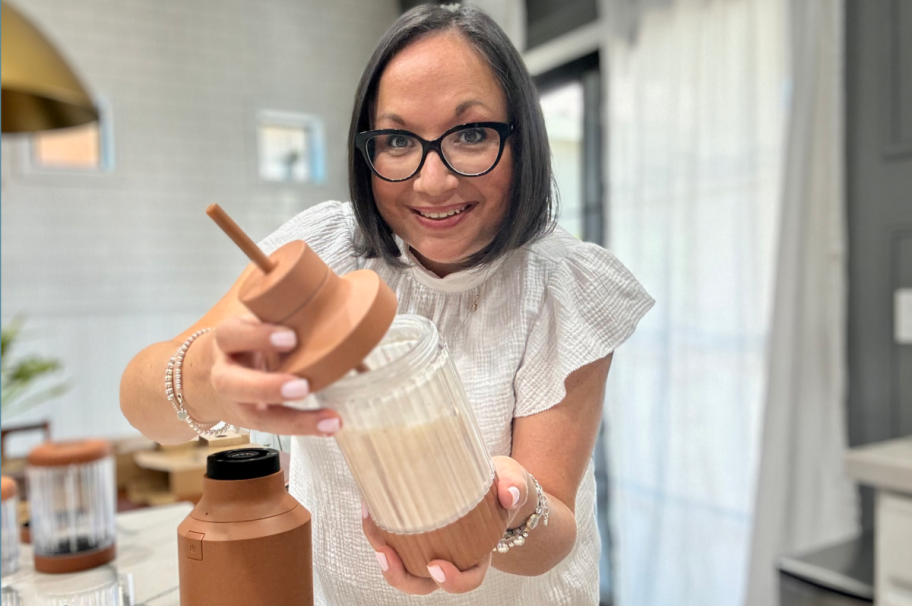 woman making a protein shake