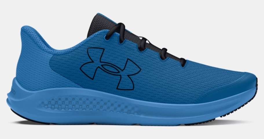 a blue kids Under Armour running shoe