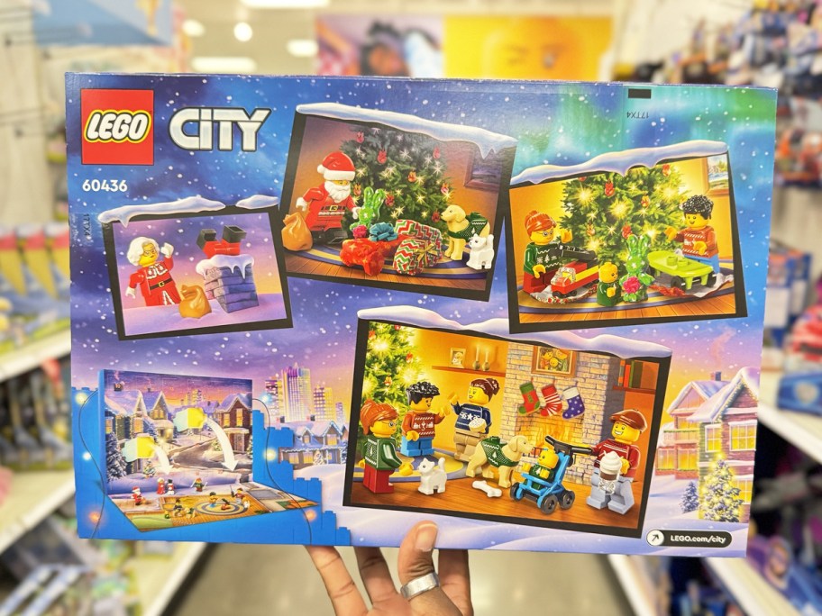 hand holding up LEGO City Advent Calendar in store