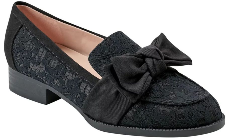 a black lace loafer with a bow