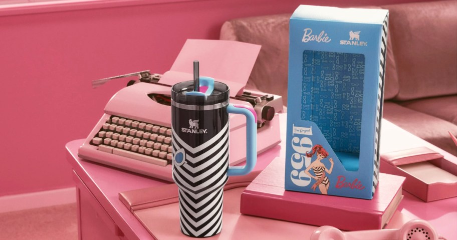 black and white barbie stanley tumbler on pink desk