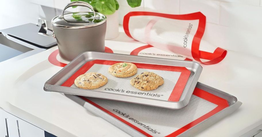 Cook's Essentials 5-Piece Silicone Baking Mats on stove with cookies on it