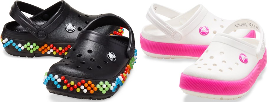 pairs of black and white/pink light-up crocs clogs