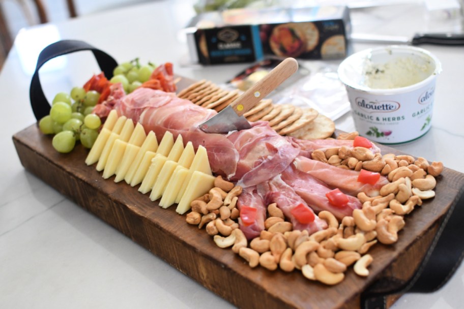 arm and hand shaped meat and cheese halloween board 
