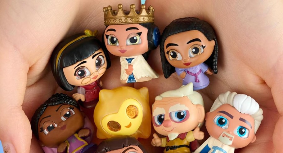 hand cupped with Disney Doorables Wish Collector Peek