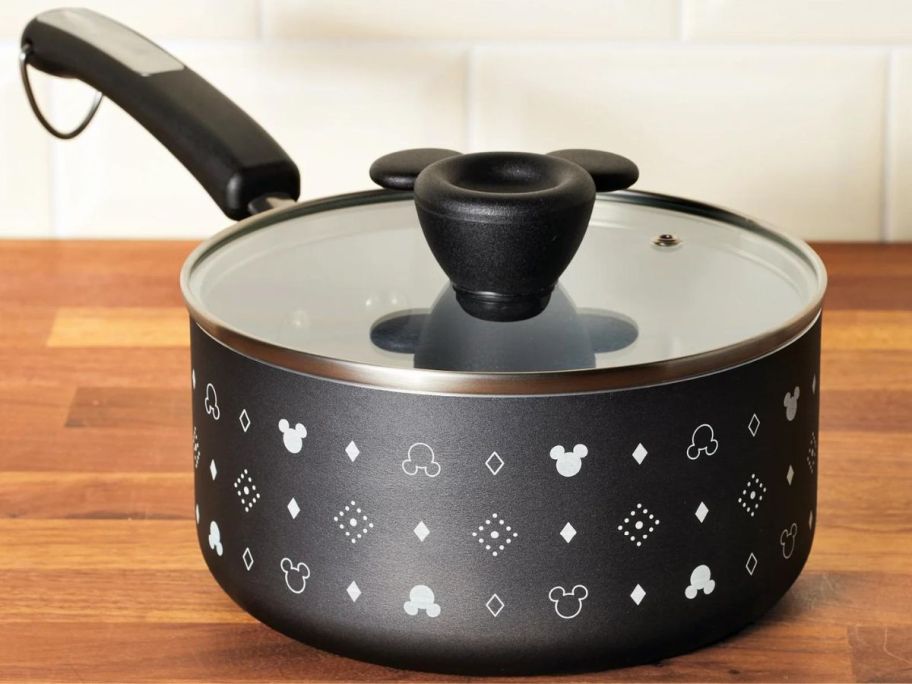 A Farberware mickey Mouse Sauce Pot with Lid