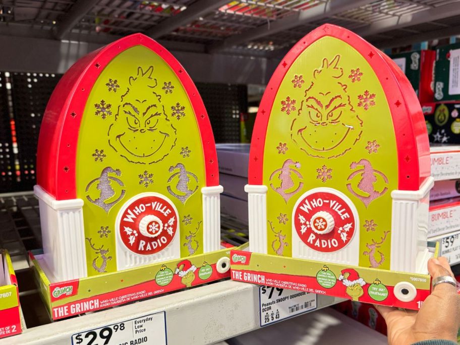 Grinch Musical Animatronic Who-Ville Radio Decoration on shelf in store
