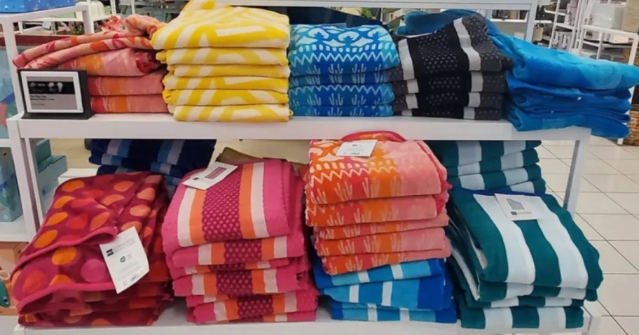 a store display of colorful Beach Towels at Kohls