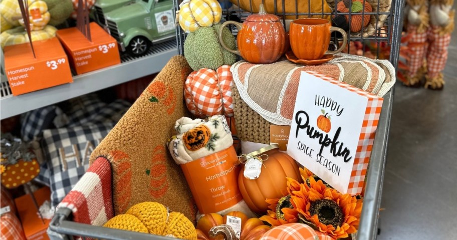 shopping cart full of fall decor items