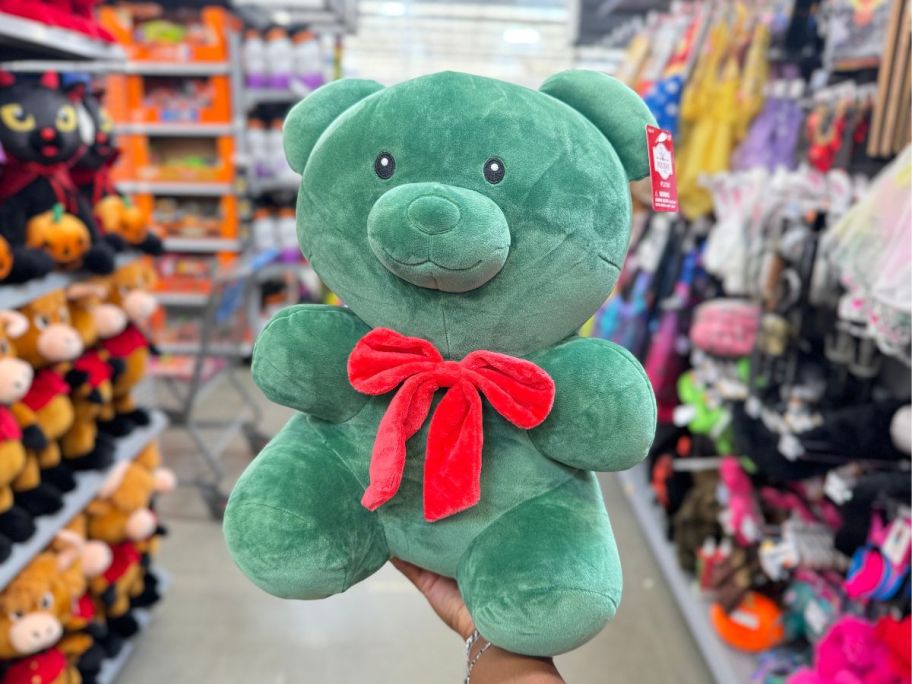 Holiday Time Green Gummy Bear Plush in hand in store