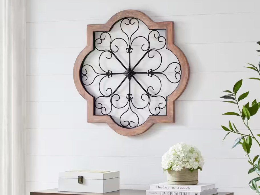 wood and metal medallion wall art on wall