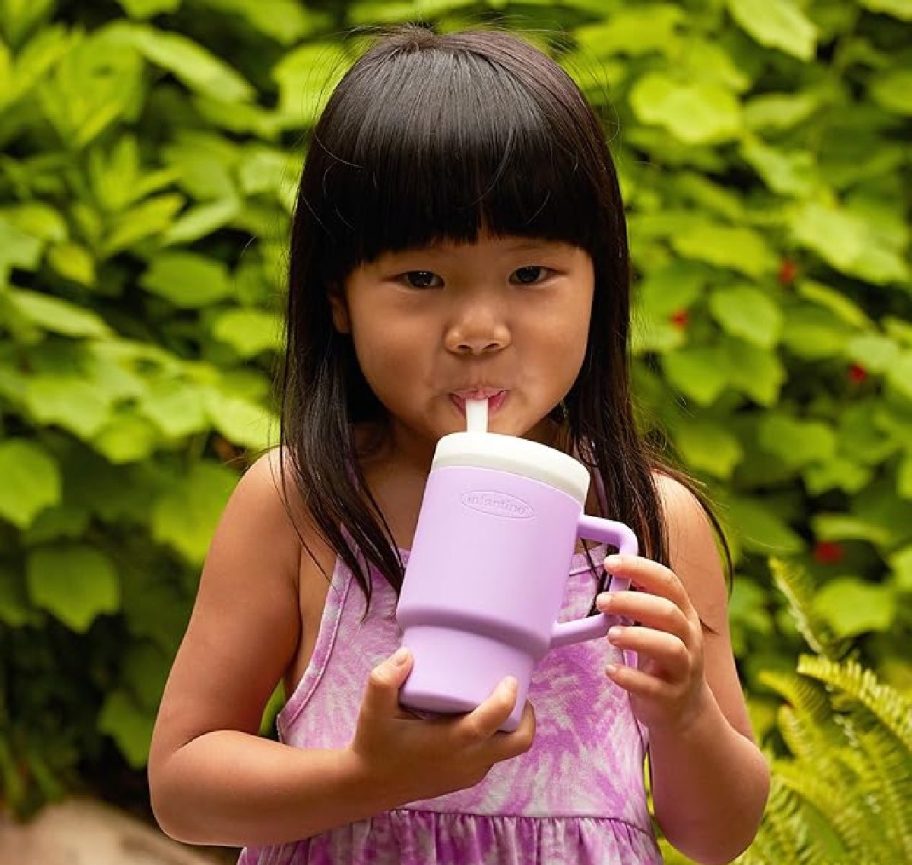 A toddler girl sipping on her My 1st Tumbler