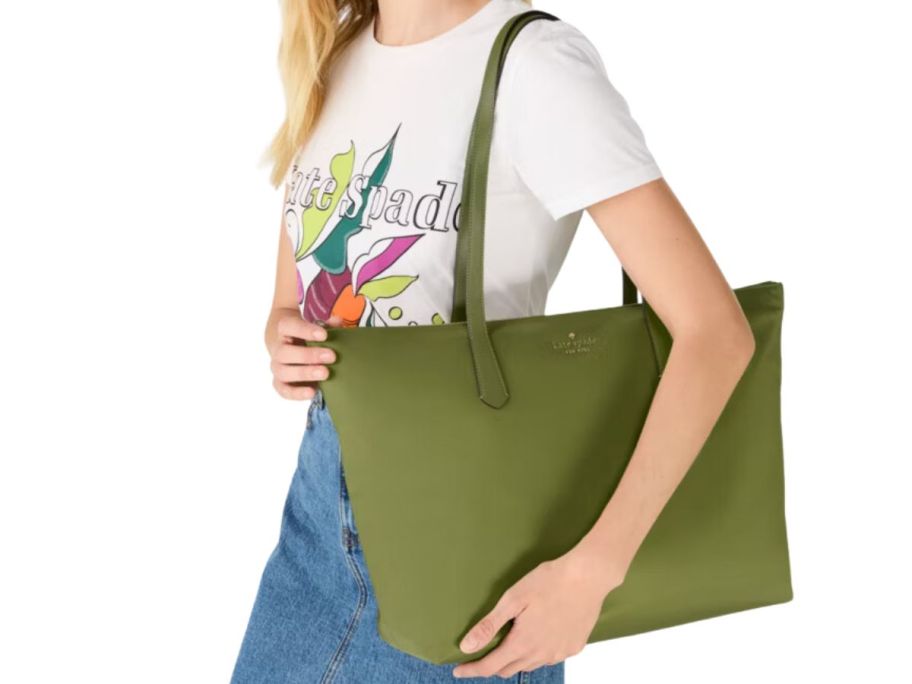 woman carrying Kate Spade Kitt Nylon Extra Large Tote