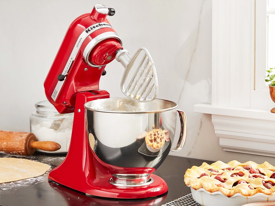 red kitchenaid mixer with pastry attachment