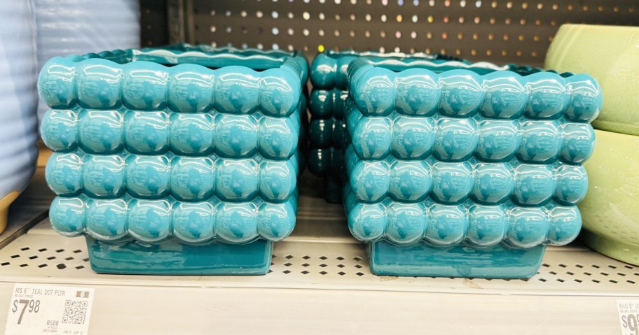 teal square bubble planters on store shelf