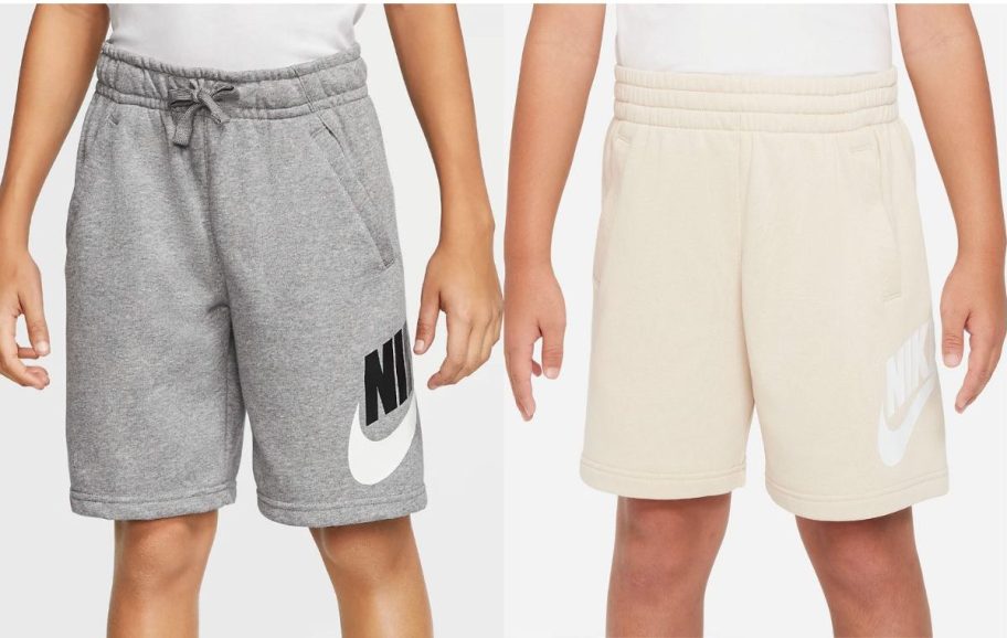 Stock images of two kids wearing Nike shorts