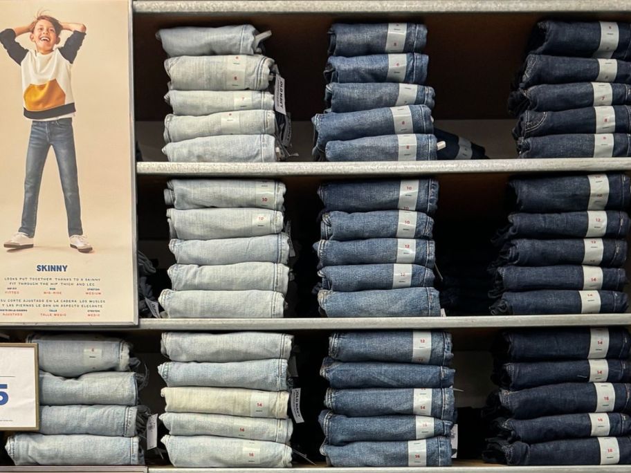 A wall of boys WOW jeans at Old Navy